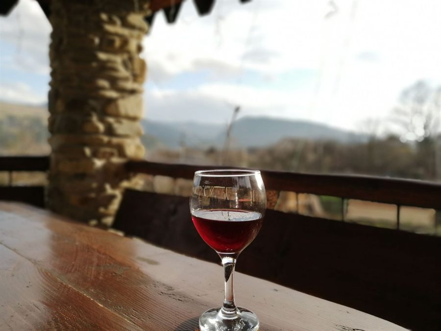 Red wine on a balcony table